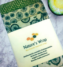 Load image into Gallery viewer, reusable beeswax food wraps set of three, eco friendly food storage , green medley of black and green, bikes ,white flowers beeswax cloth