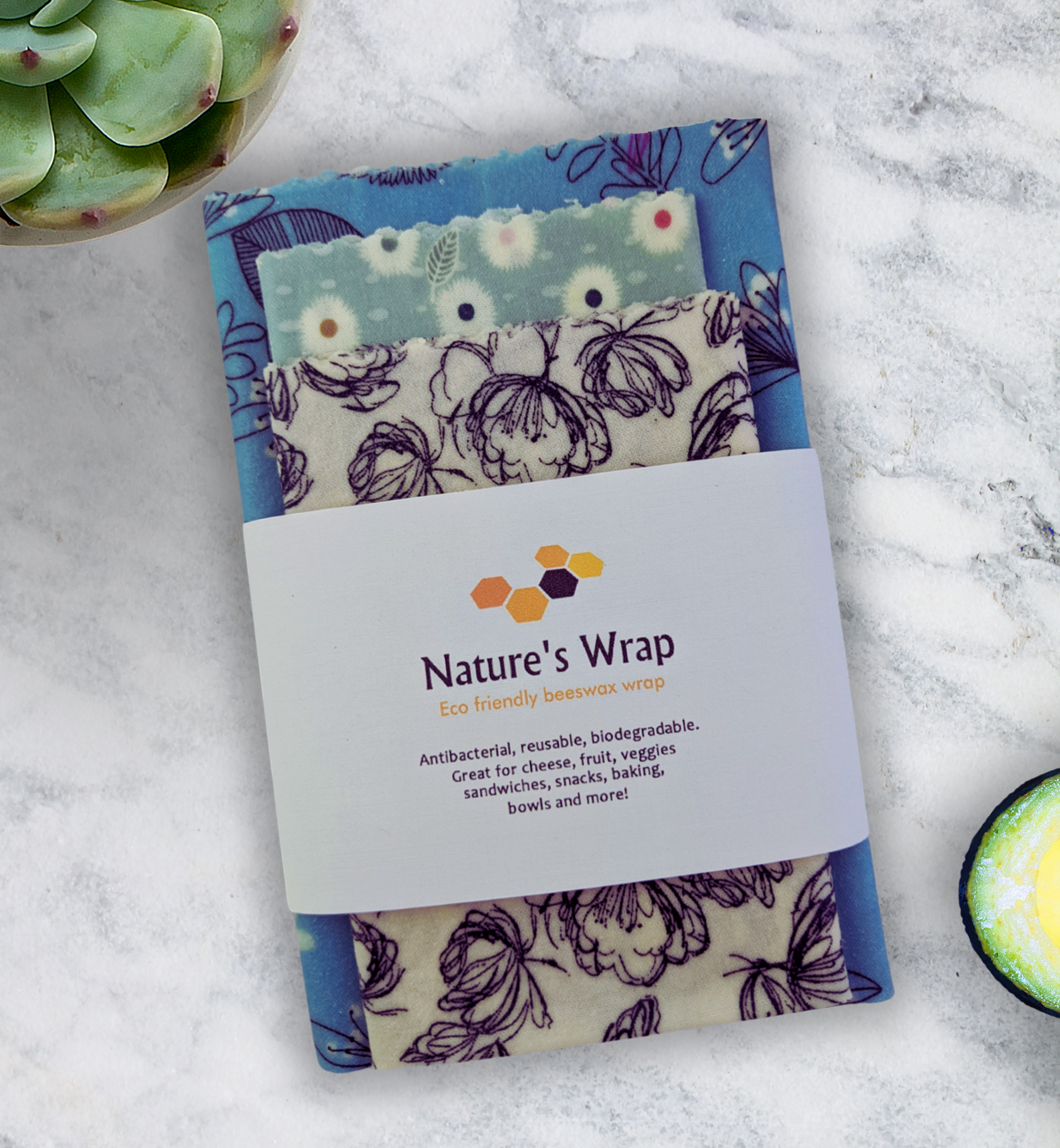 reusable beeswax food wraps set of three, eco friendly food storage , blue floral, floral black sketch and colored white dots on blue beeswax cloth